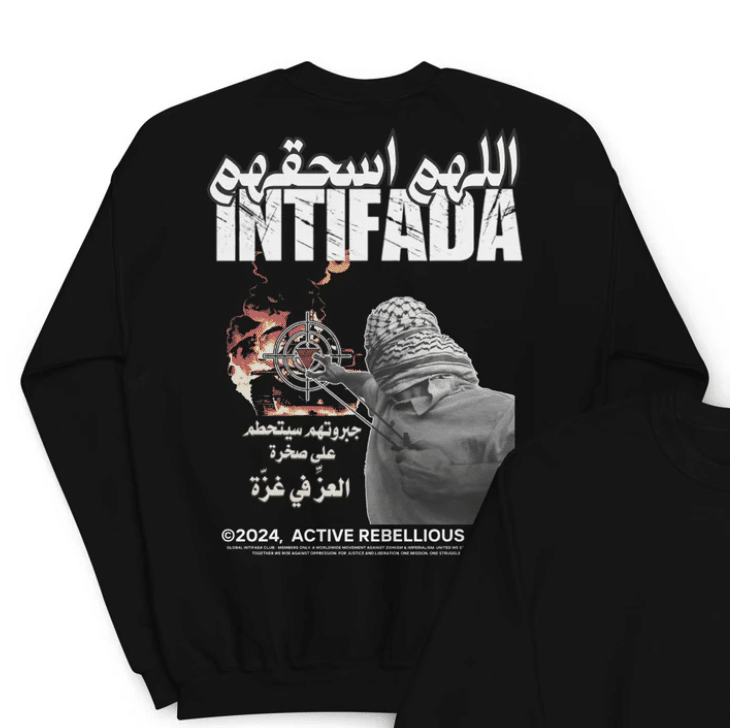 Black sweatshirt featuring the word “Intifada” in bold, Arabic script reading “O Allah, crush them,” an armed figure aiming at a target, and Arabic text referencing Gaza.