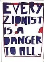 Handwritten sign with large block letters reading “Every Zionist is a danger to all,” displayed on a white background with red and blue coloring.
