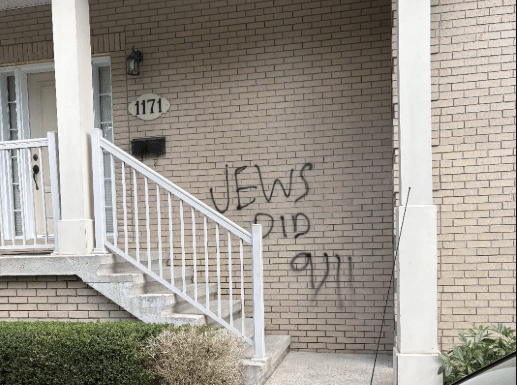 Antisemitic graffiti reading “Jews did 9/11” spray-painted on the exterior wall of a Jewish building in Halifax, Canada. Photo: