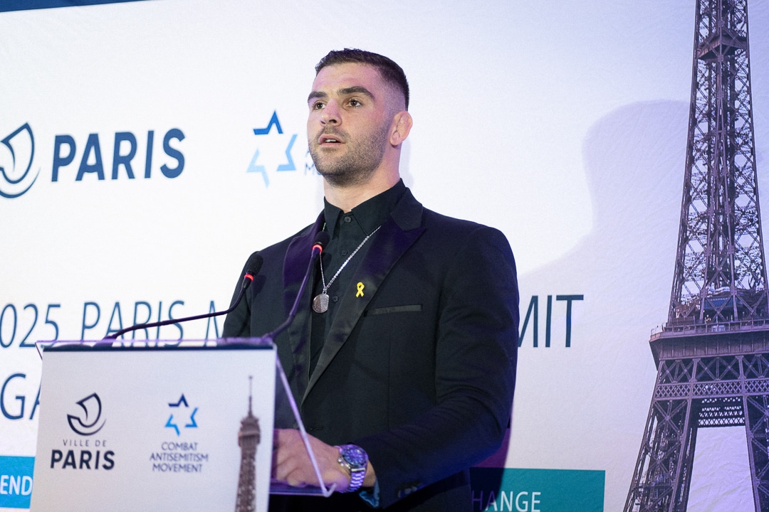Israeli Olympic judoka Peter Palchik speaks at the podium during the 2025 Paris Mayors Summit Against Antisemitism, organized by the Combat Antisemitism Movement