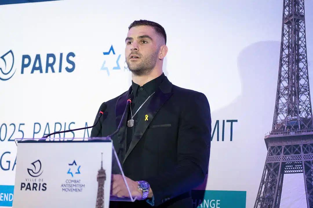 Israeli Olympic judoka Peter Palchik speaks at the podium during the 2025 Paris Mayors Summit Against Antisemitism, organized by the Combat Antisemitism Movement