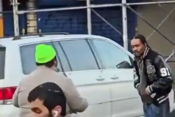 Footage shared on social media shows two men on a Crown Heights street near a white vehicle during an incident under NYPD investigation.