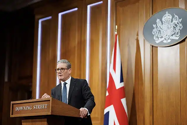 UK Prime Minister Keir Starmer speaks at a lectern outside Downing Street