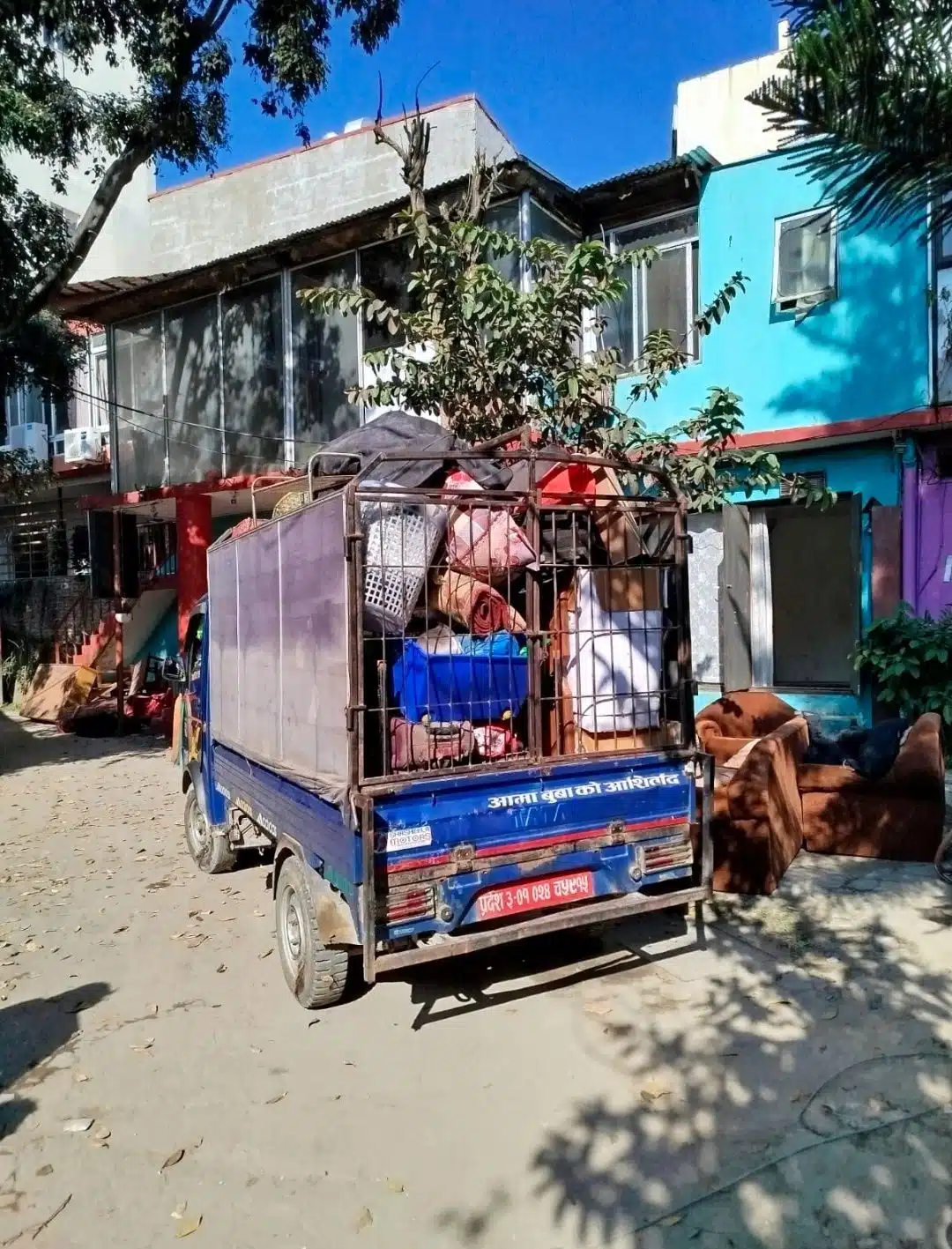 A small truck loaded with furniture and personal belongings outside the former Chabad House in Kathmandu, Nepal, following the center’s forced relocation.