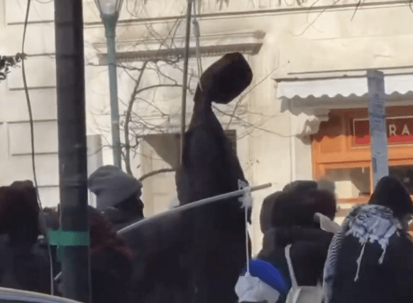 Protesters at an anti-Israel rally in Philadelphia display an effigy resembling an Israeli soldier hanging in a noose.
