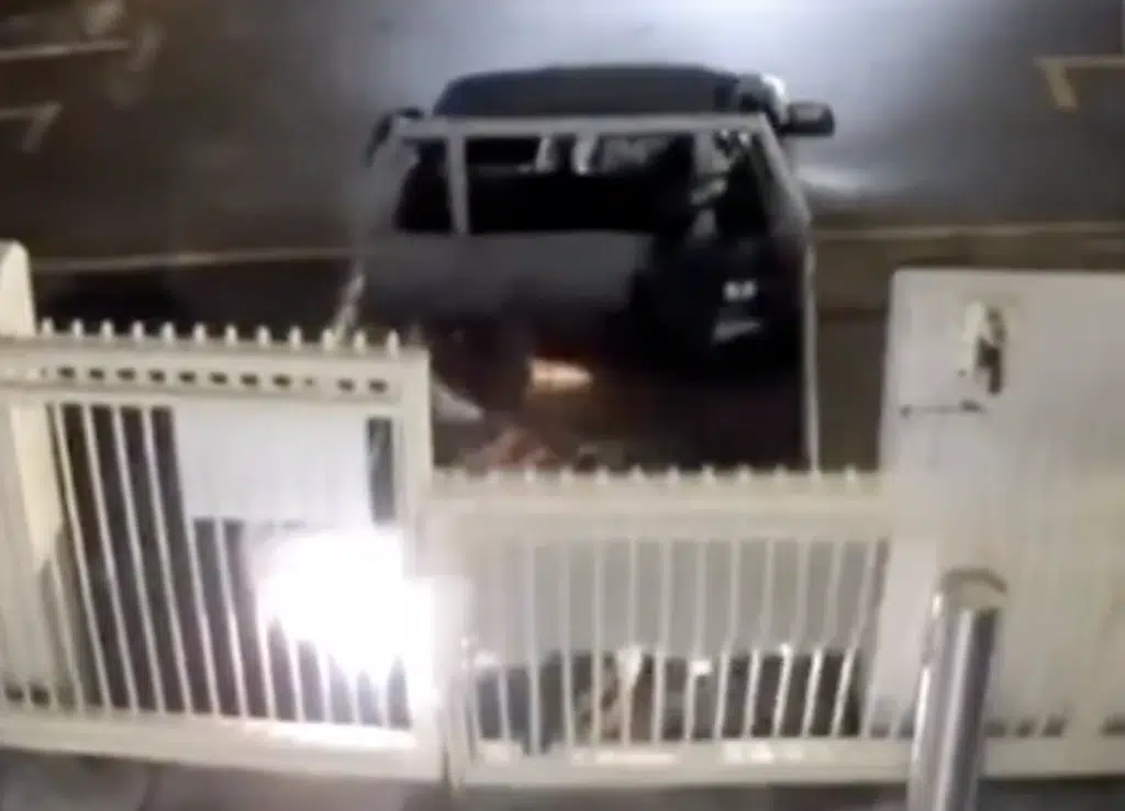 Truck reversing into the front gates of a Brisbane synagogue during antisemitic attack captured on security camera footage.