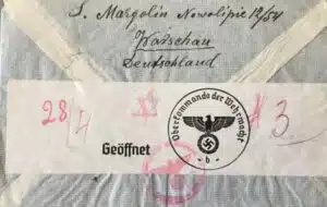 Censored envelope sent from the Warsaw Ghetto, marked with Nazi inspection stamps, addressed to family members who had escaped to Japan.