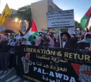 Pro-Hamas demonstrators gather outside a synagogue in Brooklyn’s Flatbush neighborhood during protests against an Israeli real estate event