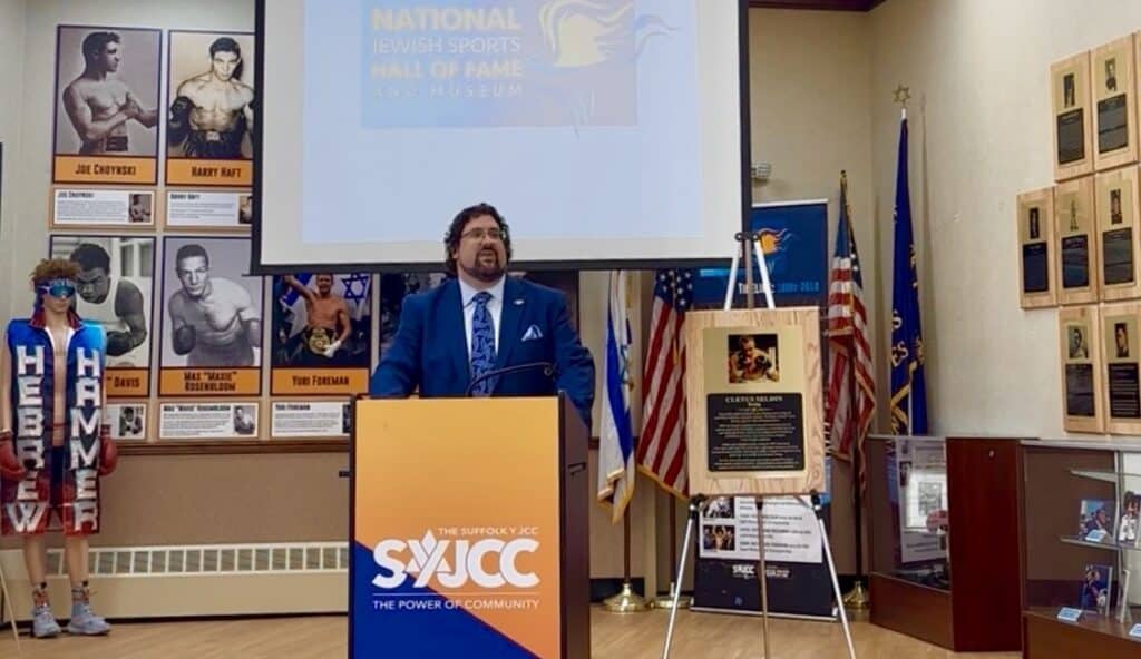 Jason Bartow speaks at a National Jewish Sports Hall of Fame event at the Suffolk Y JCC.