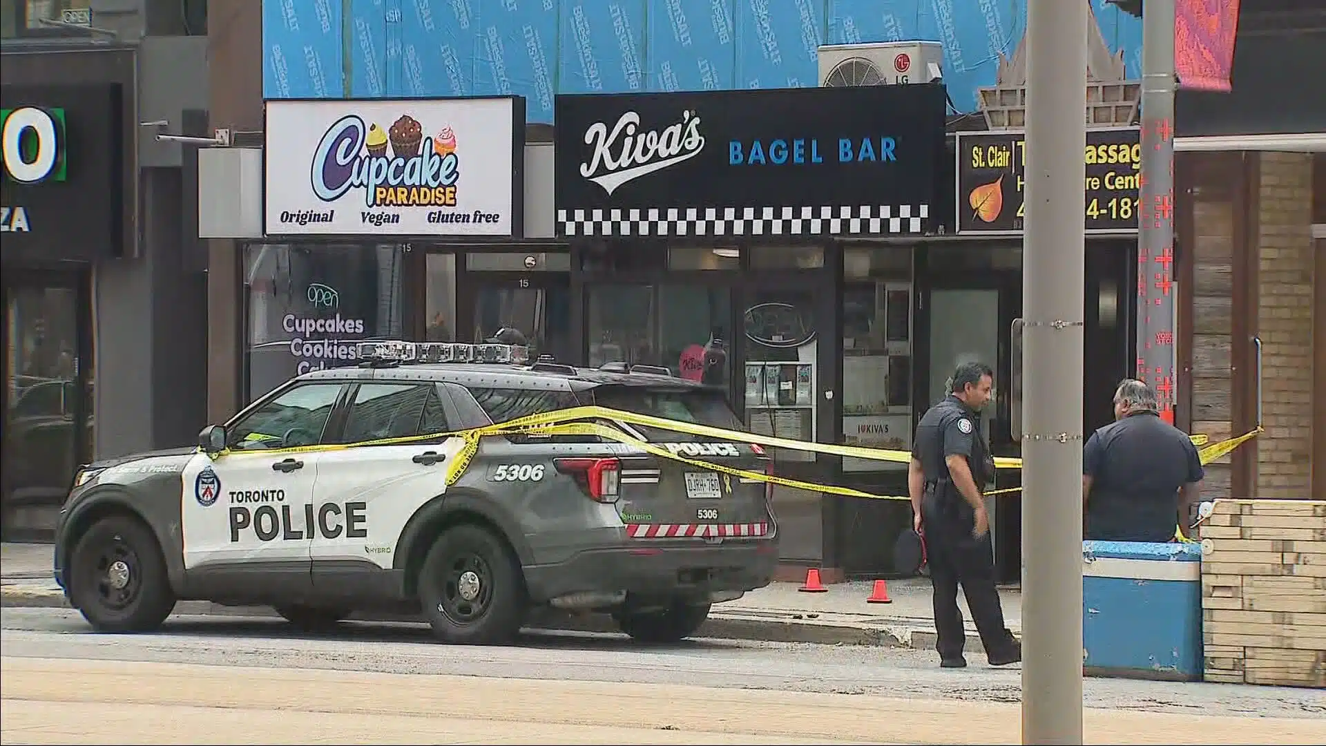 Toronto police investigate outside a Kiva's Bagel Bar after gunfire struck the Jewish-owned bakery in a suspected antisemitic attack.