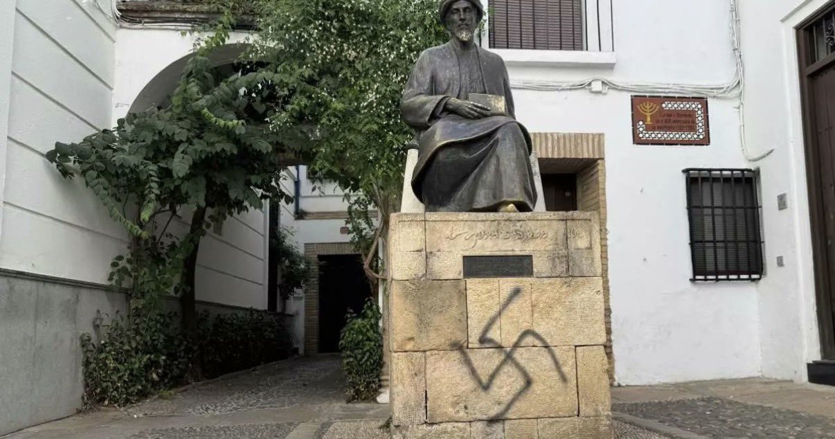 Swastika spray-painted on the base of the Maimonides (Rambam) statue in Córdoba's historic Jewish quarter, Spain.