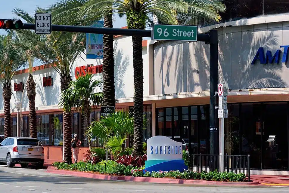 Palm-lined street in Surfside, Florida, near 96th Street.
