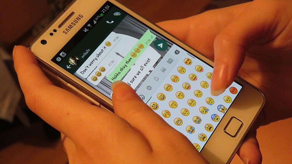 Person typing a message on WhatsApp