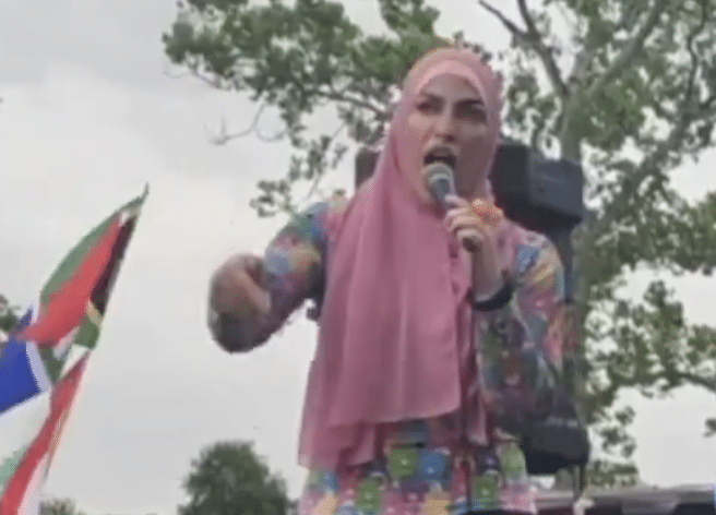 Windsor council candidate Rasha Zaid speaks into a microphone during a pro-Palestinian demonstration.